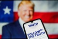 Truth social media on smartphone. TRUTH Social is AmericaÃ¢â¬â¢s Ã¢â¬ÅBig TentÃ¢â¬Â social media platform owned by Donald Trump Royalty Free Stock Photo